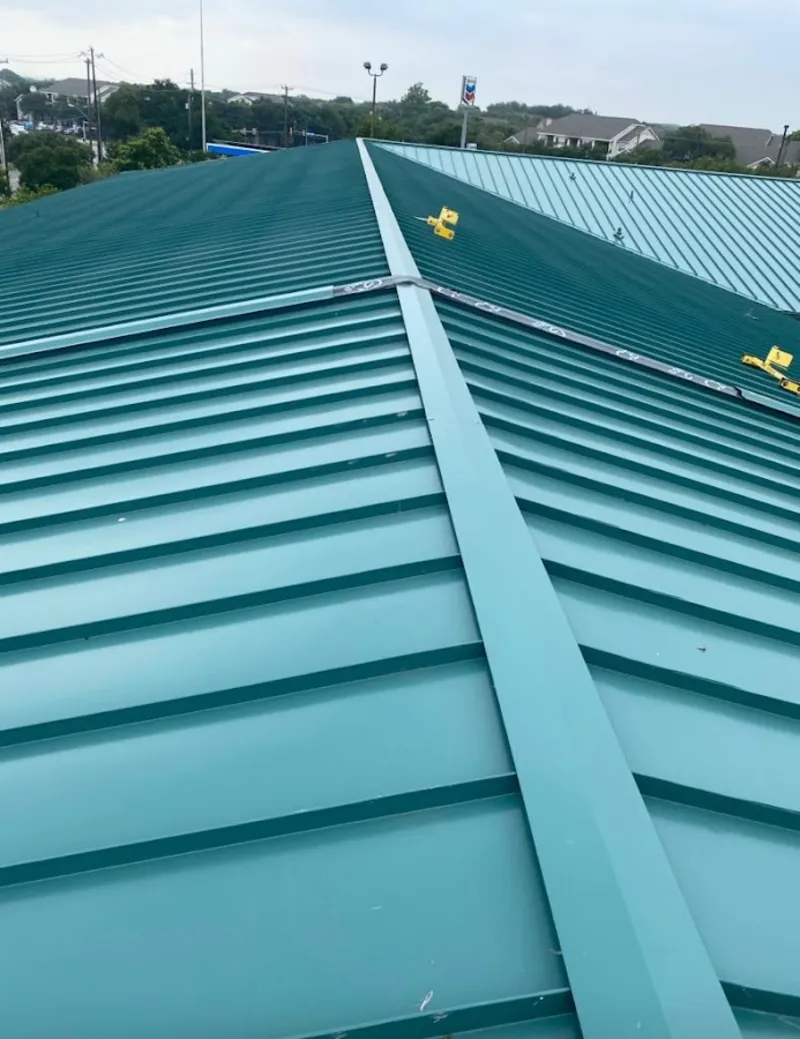 Green commercial metal roof ridge and valley for Metal Roof Repair in Lealman